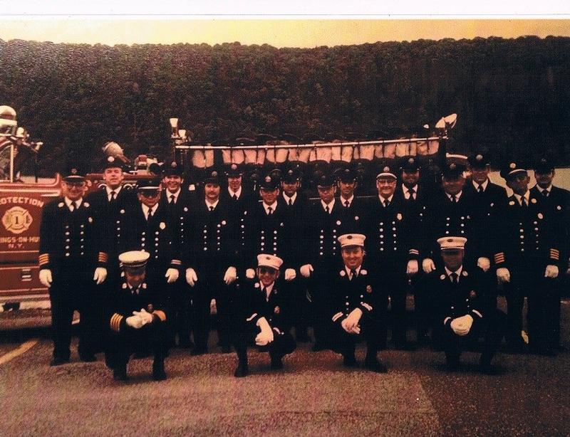 Protection Co - Summer 1975 - Back Row (L-R) Jack Wright, Bob Hegney, Robin Castaldo, Victor Quintanella, Tom Paretti, George Burghardt, Butch Chemka, Donald Craig.  Middle Row (L-R) Jack Cattell, David Usher, Robert Licht, Jay Kazura, Tom Tillson, Jim Craig, Don Mattson, A.J. Paretti.
Front Row (L-R) Chief Sammy Caruso, 2nd Lt. Richie Genshino, Captain Robert Schnibbe Jr., 1st Lt. George Fisher